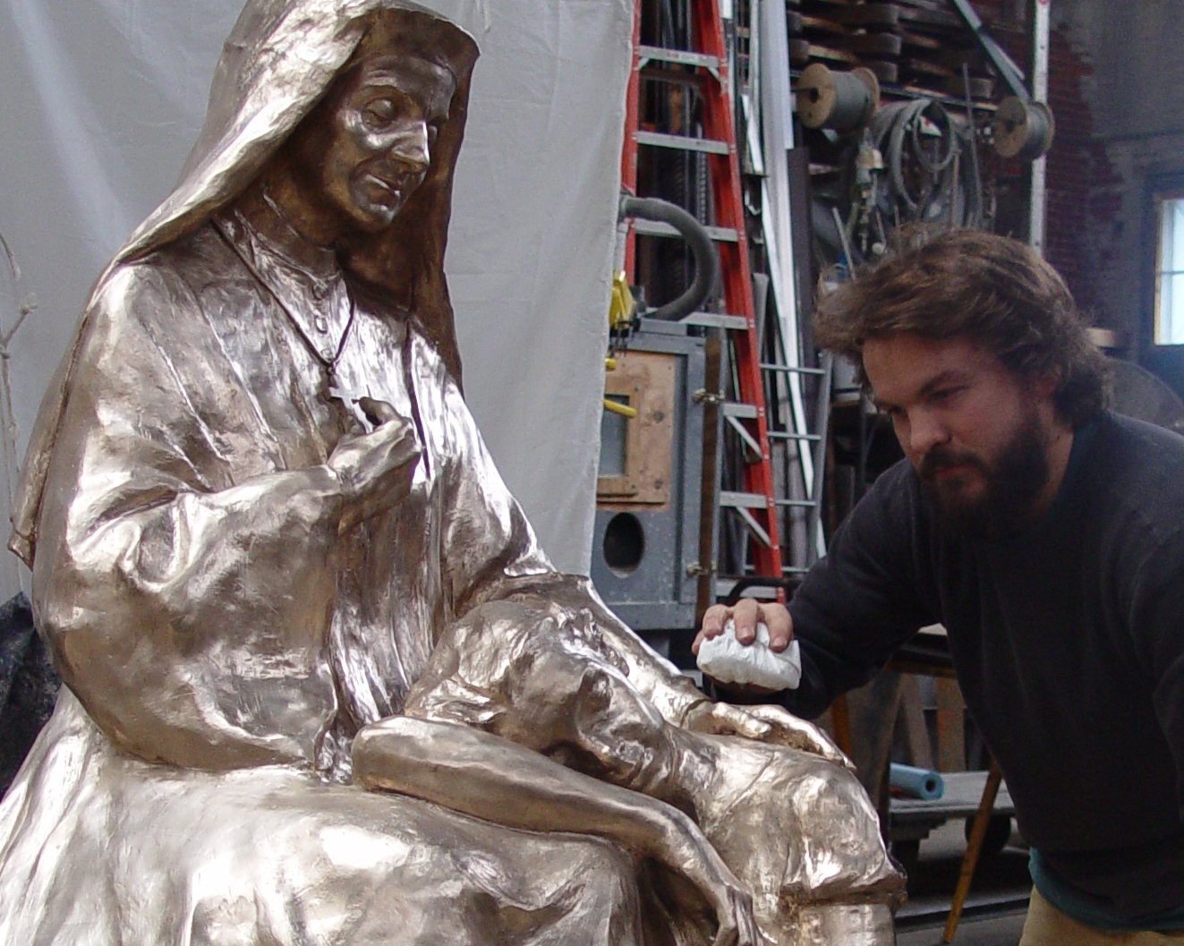The statue is sandblasted and polished