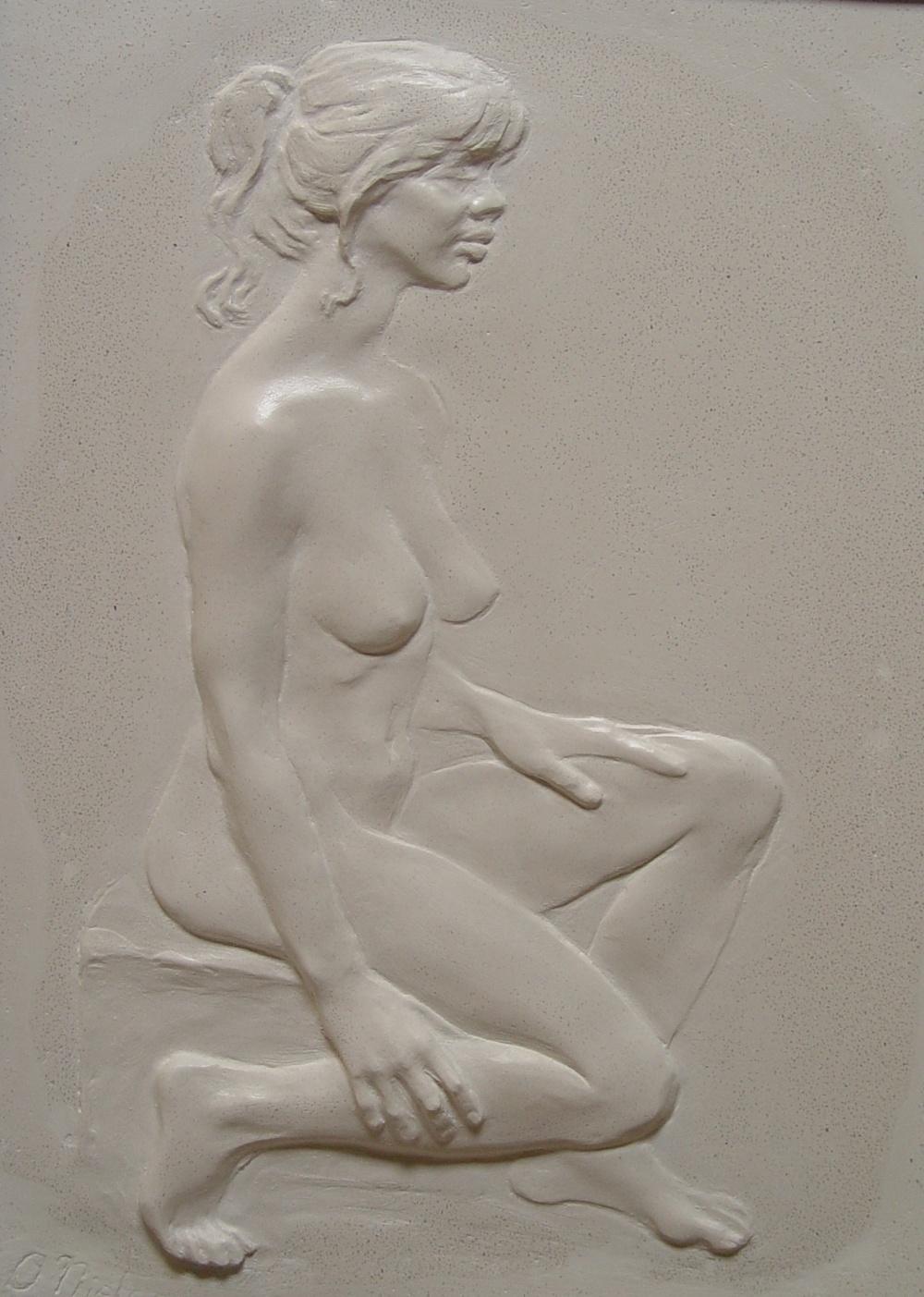 Seated Nude, cast stone, 16 inches high